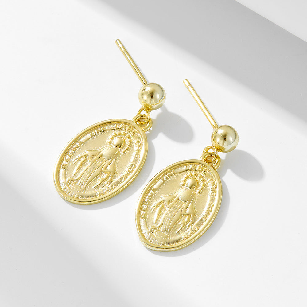 Vintage oval earrings featuring Virgin Mary relief portrait in pure silver