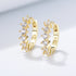 Round C-shaped diamond studded zircon earrings