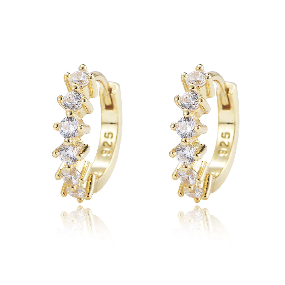 Round C-shaped diamond studded zircon earrings