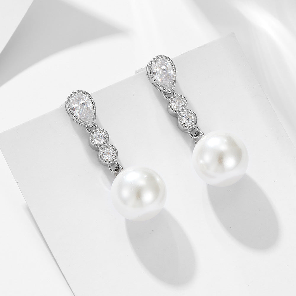 Long silver pearl earrings with light luxury and diamond studded earrings