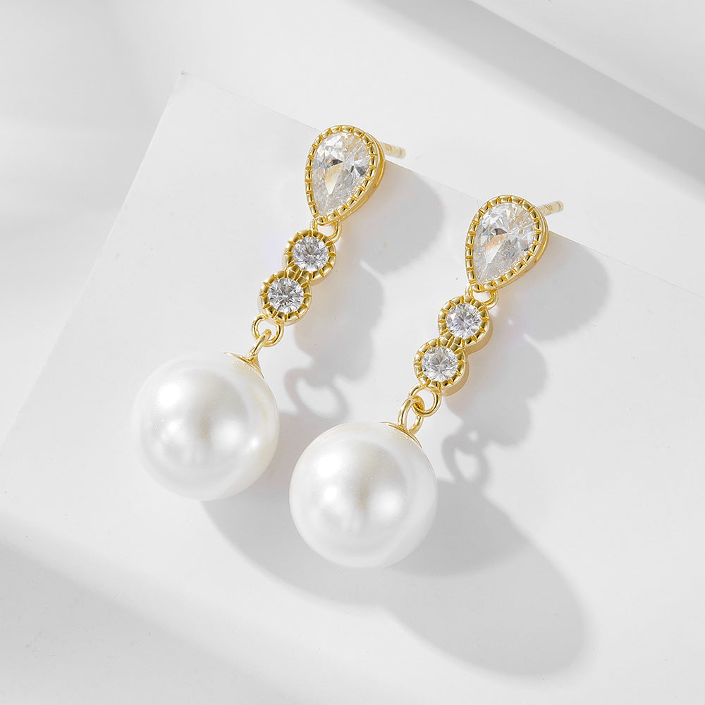 Long silver pearl earrings with light luxury and diamond studded earrings