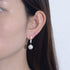 Long silver pearl earrings with light luxury and diamond studded earrings