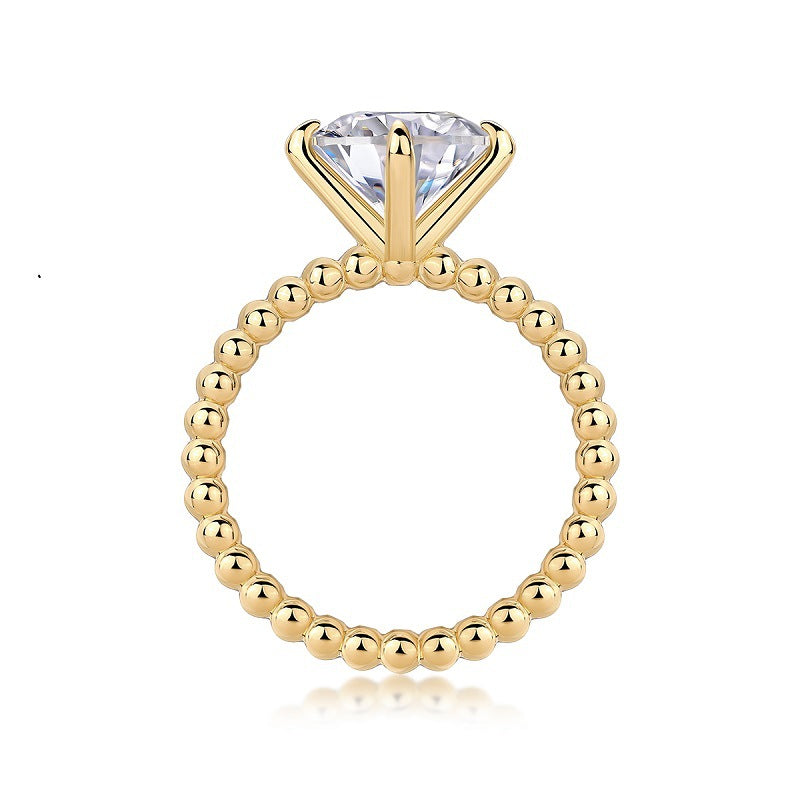 Gold-toned style 925 silver four-prong ring with moissanite comes with certificate