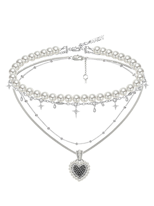 Sweet woven contrasting heart-shaped necklace with pearls layered on collarbone chain