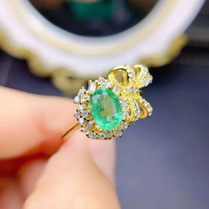 Genuine oval cut emerald ring