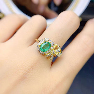 Genuine oval cut emerald ring