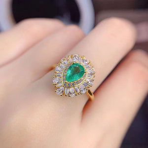 Real emerald pear cut diamond ring