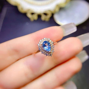 Genuine topaz pear cut diamond ring