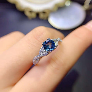 Genuine london blue topaz round cut ring