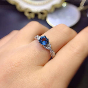 Genuine london blue topaz round cut ring