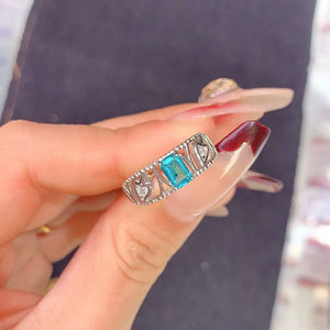 Paraiba topaz emerald cut diamond ring