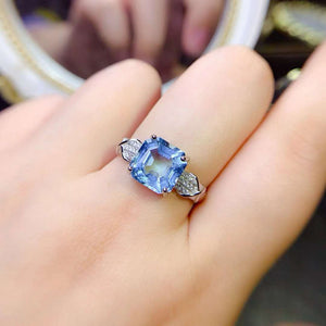 Real blue topaz emerald cut diamond ring