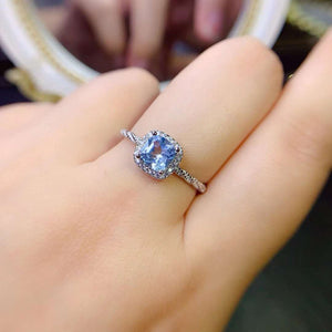 Genuine blue topaz emerald cut ring