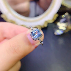Genuine blue topaz emerald cut ring