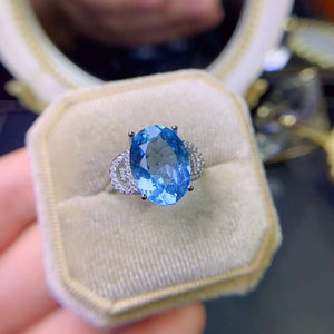 Genuine blue topaz oval cut ring