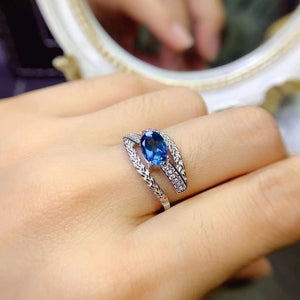 Genuine london blue topaz oval cut diamond ring