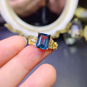Genuine london blue topaz emerald cut diamond ring