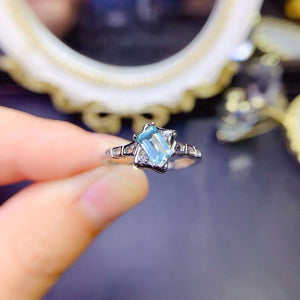 Real blue topaz emerald cut ring