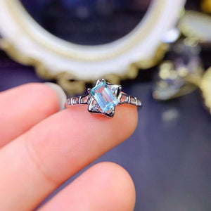 Real blue topaz emerald cut ring