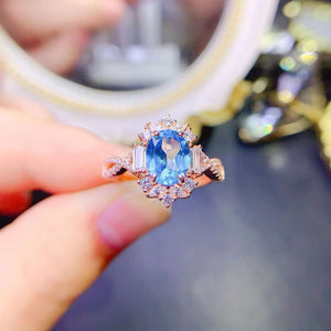 Real blue topaz oval cut ring
