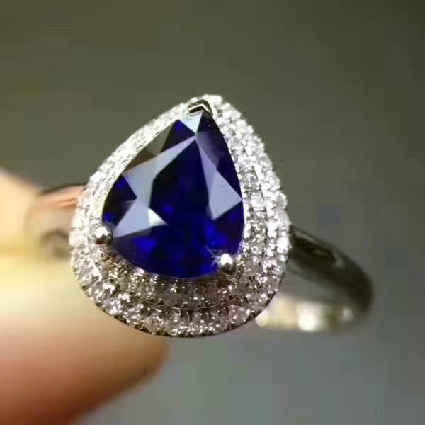 Genuine sapphire pear cut silver free size ring