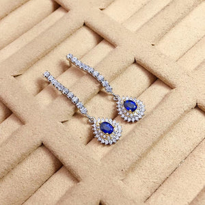 Natural oval cut sapphire sterling silver earrings